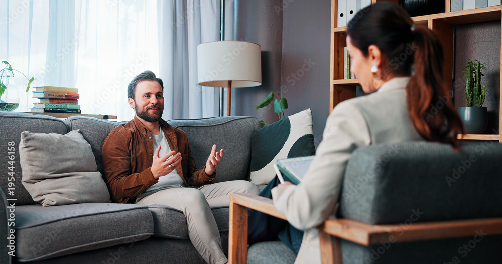 Fototapeta premium Happy man, patient and talking with therapist for counseling, rehabilitation or therapy session. Male person, client and speaking with counselor or psychologist for mental health or advice in office