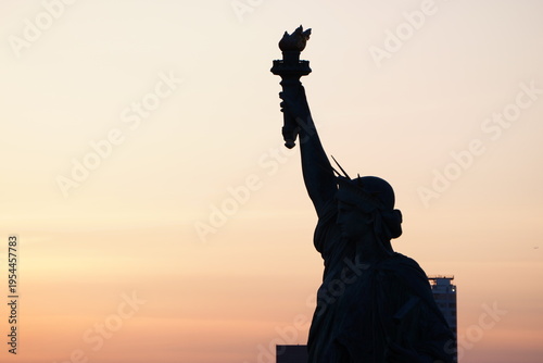 Statue of Liberty at Odaiba of Japan at the evening with sunset aroung golden hour