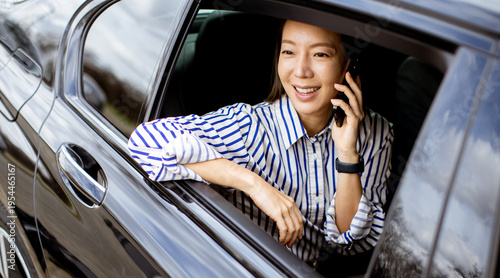 Korean woman talking on pho...