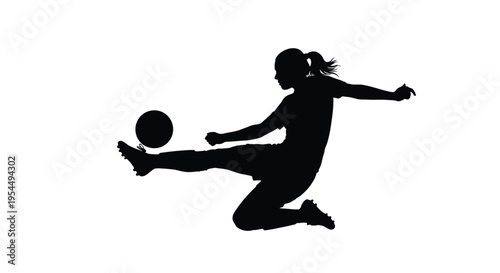 Female soccer player kicks a ball in dynamic action silhouette