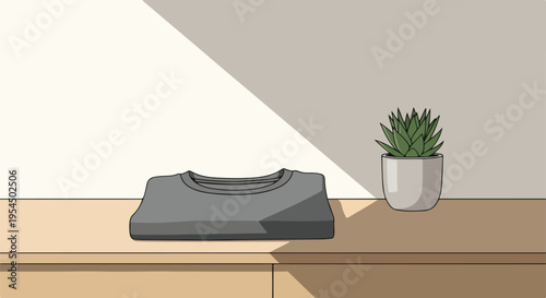 Simple modern desk with plant and wireless charger