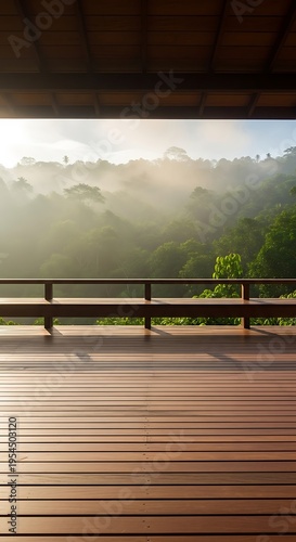 Wooden terrace overlooking a misty tropical rainforest at sunrise