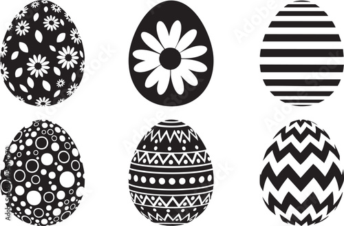 A set of six black and white Easter eggs with various patterns