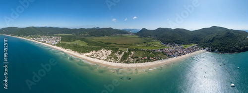 Aerial panorama of the Brazilian coast. South of the island of Santa Catarina with the views of the beaches of Acores and Pantano do Sul. Florianopolis, Brazil