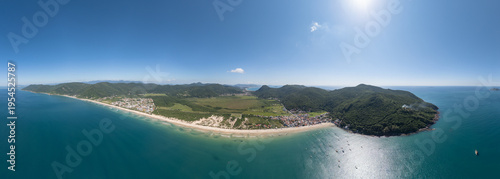 Aerial panorama of the Brazilian coast. South of the island of Santa Catarina with the views of the beaches of Acores and Pantano do Sul. Florianopolis, Brazil