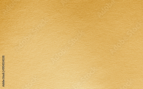 Gold background foil golden leaf metallic texture gradient light shiny reflective wrapping paper bright yellow solid color wallpaper for design decoration element backdrop