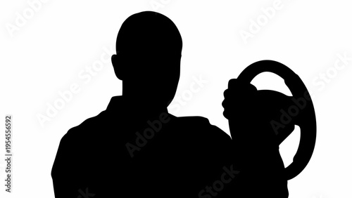 Black silhouette of a man lifting a kettlebell in a gym setting with dramatic lighting