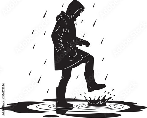 Man in raincoat splashing in puddle on rainy day