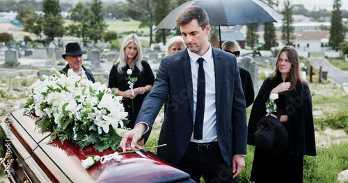 Canvastavla Man, funeral and rose with offering on coffin for grief or mourning death together in graveyard