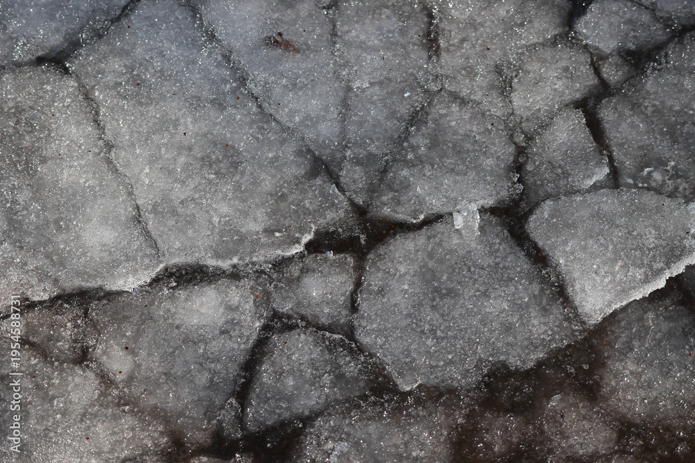 Obraz premium Close up of cracked dark ice texture