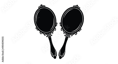 Two ornate hand mirrors presented against a stark white background silhouette