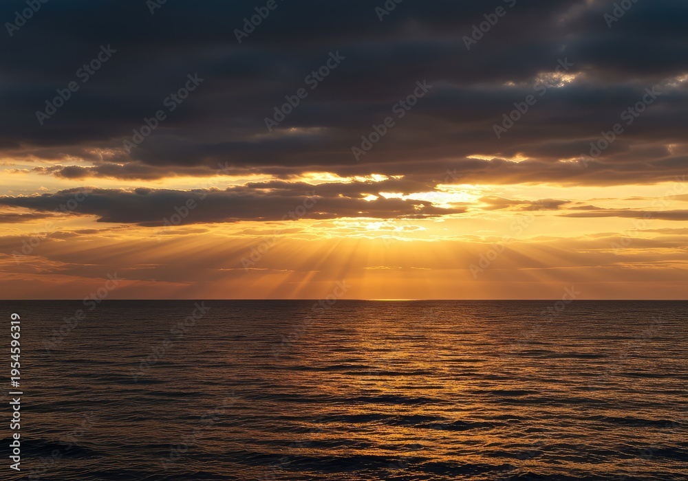 Obraz premium Dramatic warm light spreads across the expansive sea and clouds, meeting the distant calm horizon line, sky, vast, space