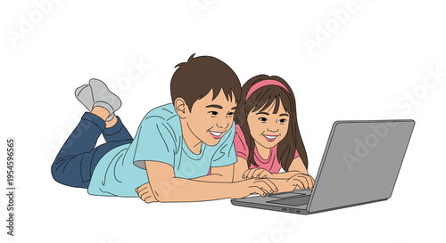 Boy and girl lie on the floor together and look happily at a laptop screen while playing or studying.