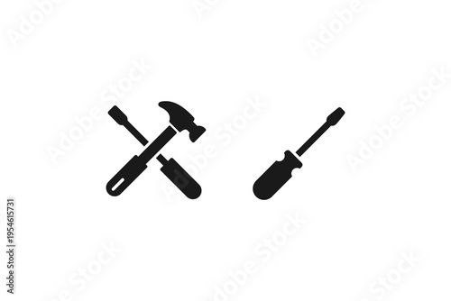 Hammer and screwdriver crossed tools icon set