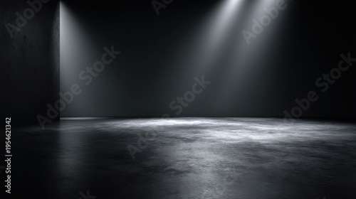 A clean black studio room with matte floor and soft ambient lighting, perfect for showcasing products against a dark, professional backdrop.