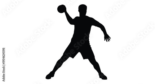 Handball player preparing to throw dynamic pose in black silhouette