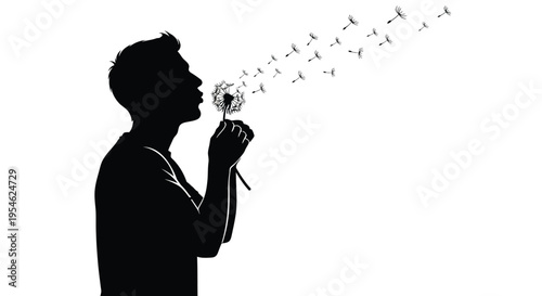 A person blowing dandelion seeds into the air dramatic silhouette