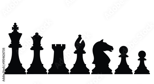 Black chess pieces arranged in a line a stark silhouette