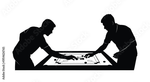 Two men intensely focused during a game of air hockey silhouette