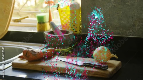 Vertical video: Magenta cyan dots appearing on start, rising over board, knife onion, showing prep