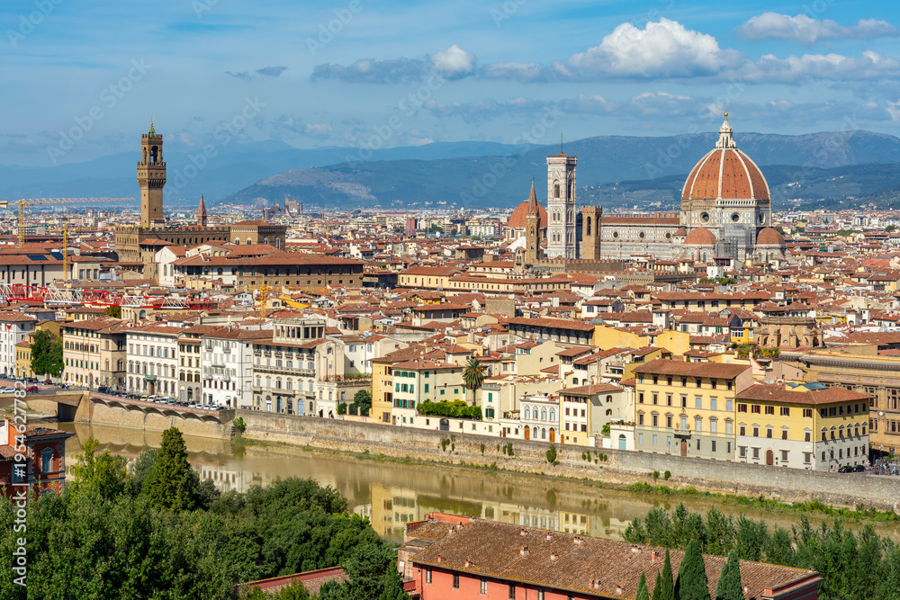 Florence cityscape with Duomo cathedral and Palazzo Vecchio palace over city center, Italy