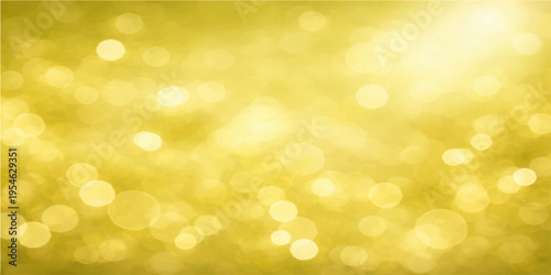Abstract golden background with blurred Christmas lights and glowing bokeh circles creating a shiny yellow and orange glitter pattern for a bright holiday celebration design
