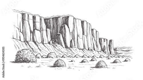 Of a vast desert landscape with towering rock formations and sparse vegetation cliff