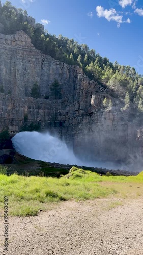 Powerful water jet splash from El Chorro drainage point of Arenos Reservoir. High quality 4k footage. Spain