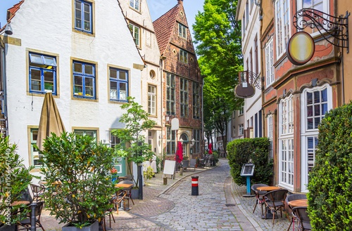 Old houses at the cobblestoned street of th Schnoor district of Bremen, Germany