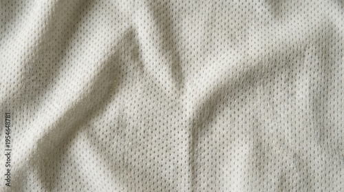 Closeup of Smooth Textured White Fabric with Elegant Wrinkles and Soft Drape