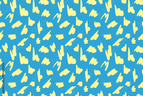 Seamless abstract pattern with playful yellow hand drawn shapes scattered on a blue background. Modern artistic texture perfect for textile prints, packaging, stationery, wallpaper and surface design