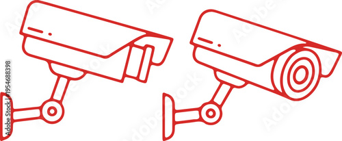 Two surveillance cameras mounted on separate wall brackets