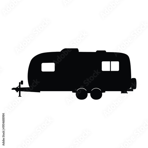 A black silhouette of a classic vintage travel trailer isolated against a clean white background