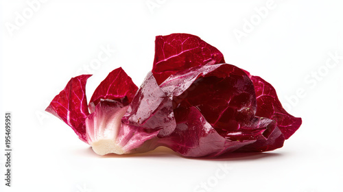 Crisp red iceberg lettuce, vibrant and fresh, perfect for salads and garnishes, showcasing its rich color and texture