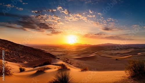 A Beautiful Sunset Over A Desert Landscape