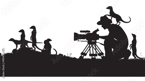 Meerkat wildlife filming silhouette with a cameraman wearing a hat and camera on a tripod in the savanna.