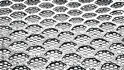 Black and white hexagonal pattern with water droplets on a metallic surface creating a unique design