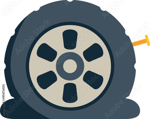 Flat tire on a vehicle wheel with a sharp nail causing damage