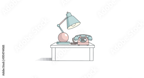 Vintage rotary telephone on desk.