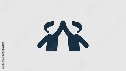 Two people high five each other in a gesture of agreement or celebration on a plain background