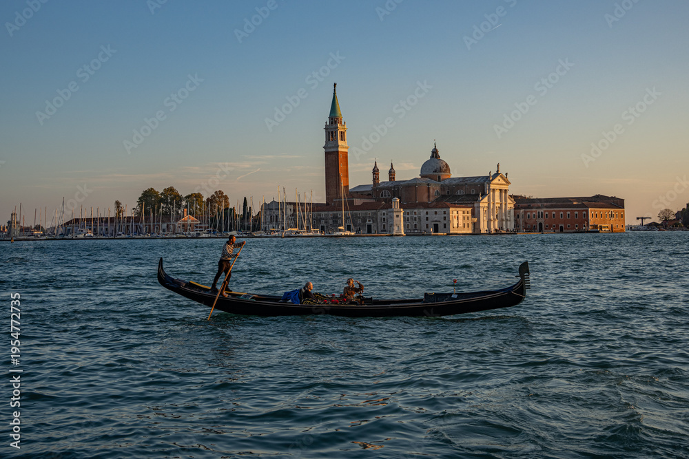 Obraz premium The photograph depicts St Mark's Square (Piazza San Marco) in Venice. Dominating the square is the bell tower (Campanile di San Marco)