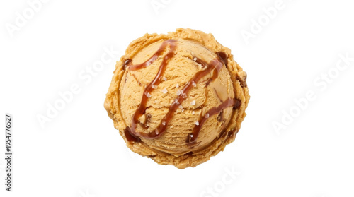 Isolated caramel ice cream scoop, drizzled with sauce and sea salt