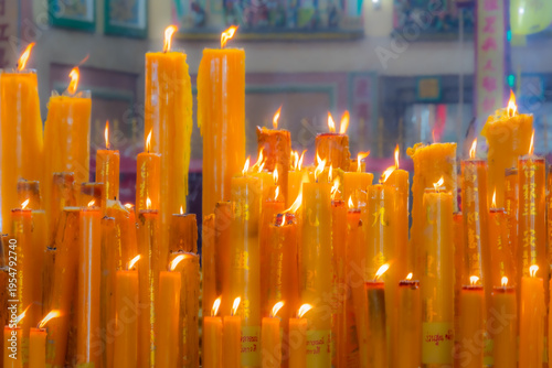 Wallpaper Mural A brightly colored candle in a Chinese Buddhist temple in Bangkok, Thailand. Torontodigital.ca