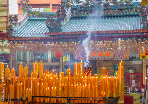 Wallpaper Mural A brightly colored candle in a Chinese Buddhist temple in Bangkok, Thailand. Torontodigital.ca