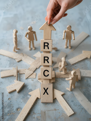 Delegating concept. Wooden figures and arrows.