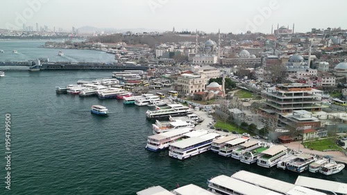 Istanbul/Turkey circa 2023: Eminonu ferry terminal in Istanbul fly away shot
