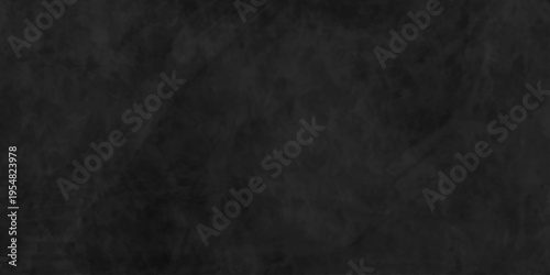 Dark charcoal grunge wall texture background. Dark black rough grunge surface with smoke edge. Black texture chalk board and black board.