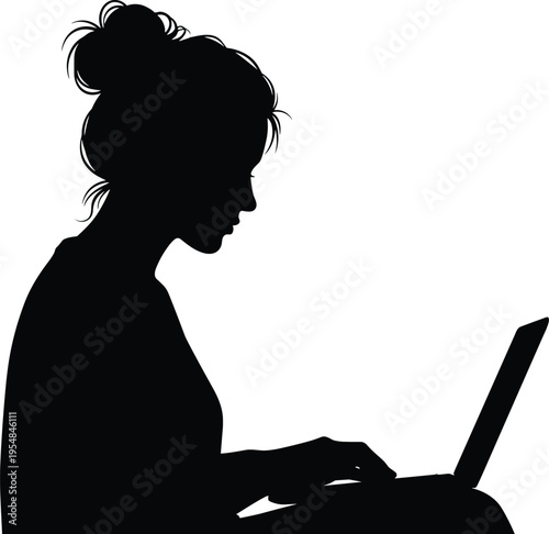 Silhouette of young professional woman with hair bun working on laptop computer, side view of female freelancer in minimalist office