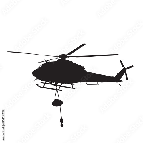 Military utility helicopter silhouette performing external sling load operation with cable and hook
