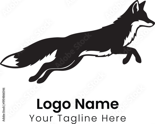 A black and white fox runs quickly across a natural landscape.